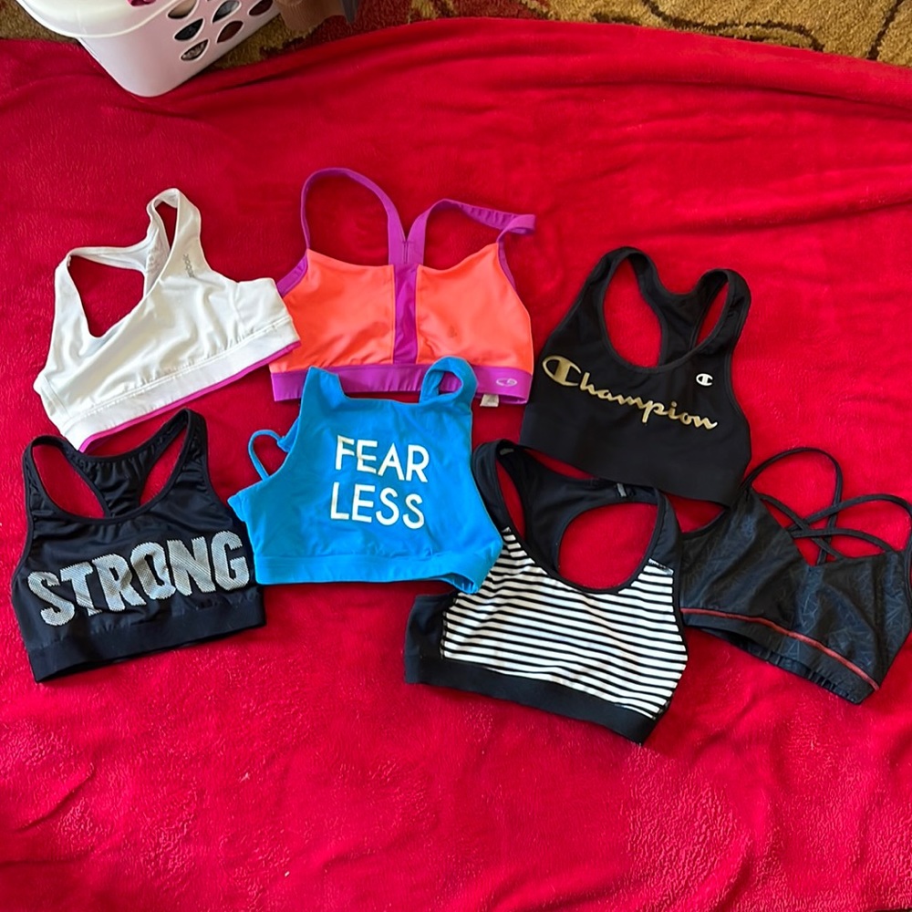 Lot of 7 sports bras. Most are xs, at least one small and one kids 10/12